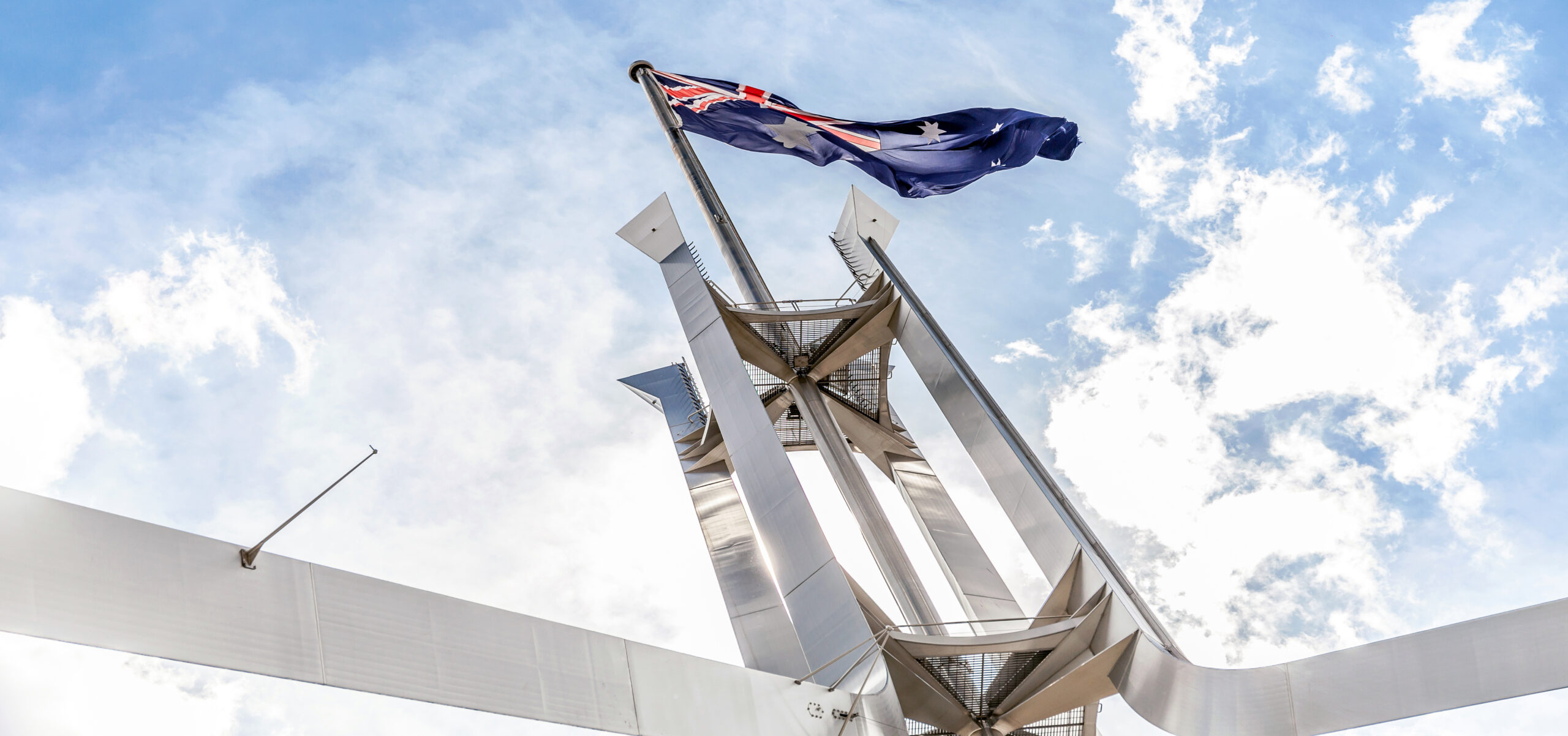 Australian flag flying over Parliament House in Canberra